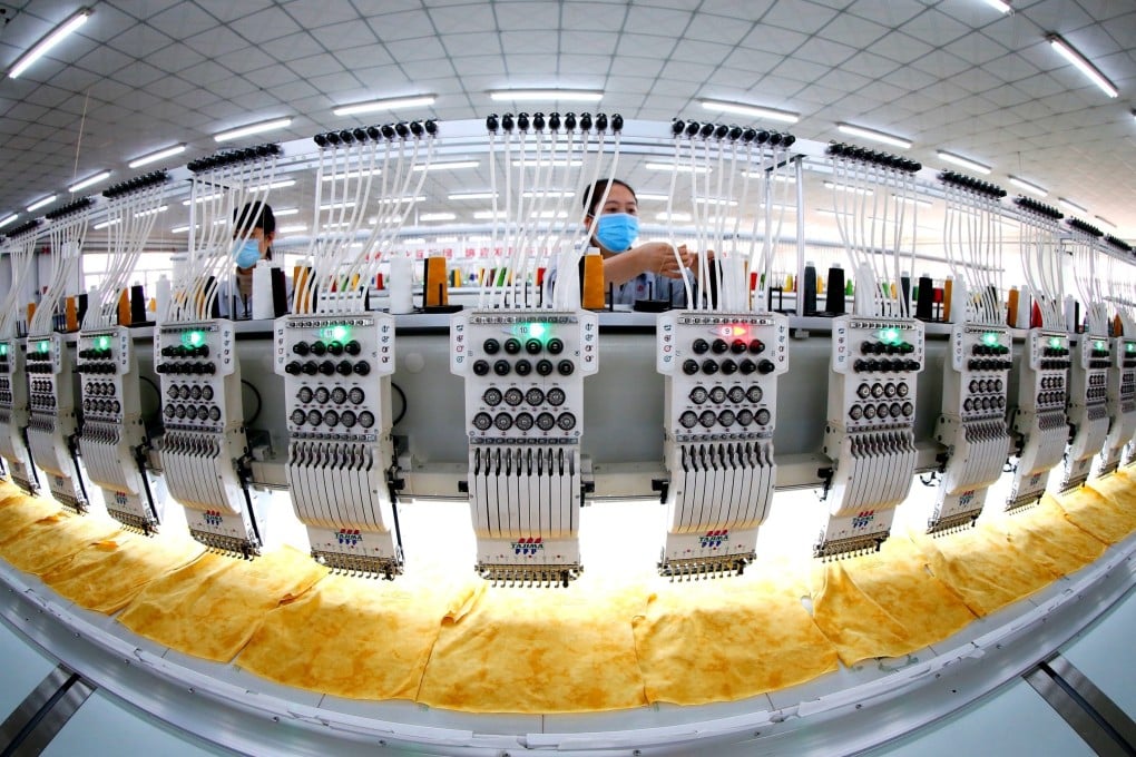 Employees work on embroidery at a Qingdao Jifa Group production line in Shandong province on February 18. China’s leaders now believe dependence on the global system is a risky bet. Photo: Xinhua