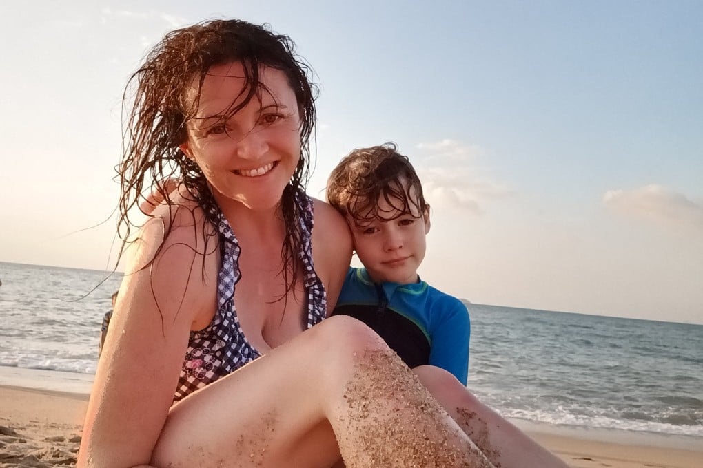 Meliosa Gormley and her son Hugh relaxing on a beach in Sanya, on Hainan island, China. Photo: Courtesy of Meliosa Gormley