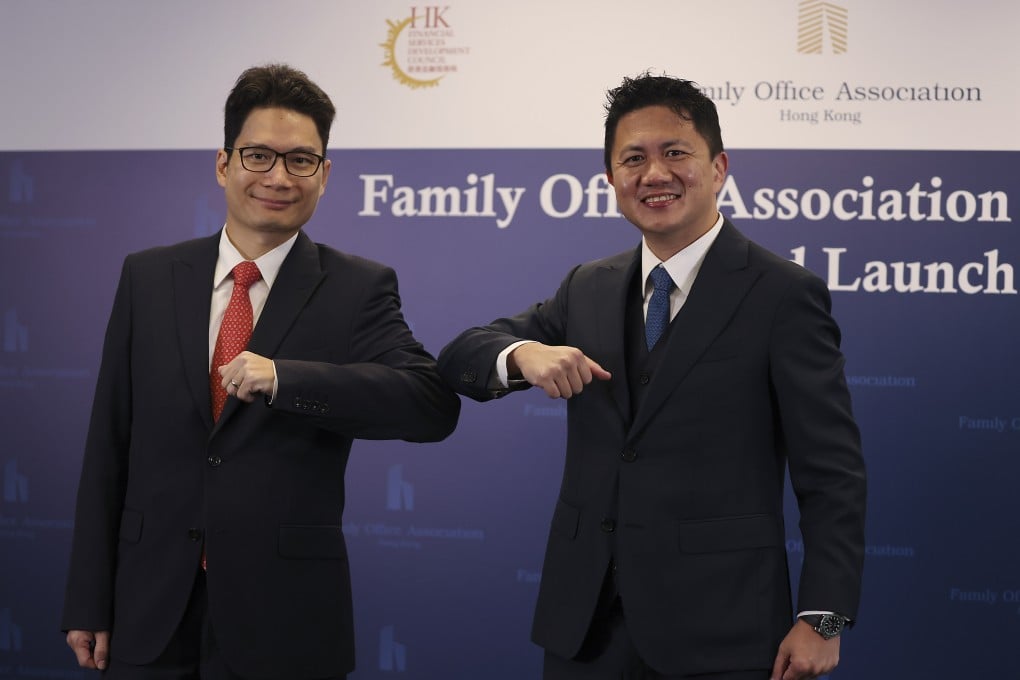 Joseph Chan Ho-lim, undersecretary for Financial services and the Treasury (left), and Kwan Chi-man, chairman of the Family Office Association Hong Kong, attend the association’s opening ceremony at the InvestHK office in Admiralty on November 18, 2020. Photo: Nora Tam