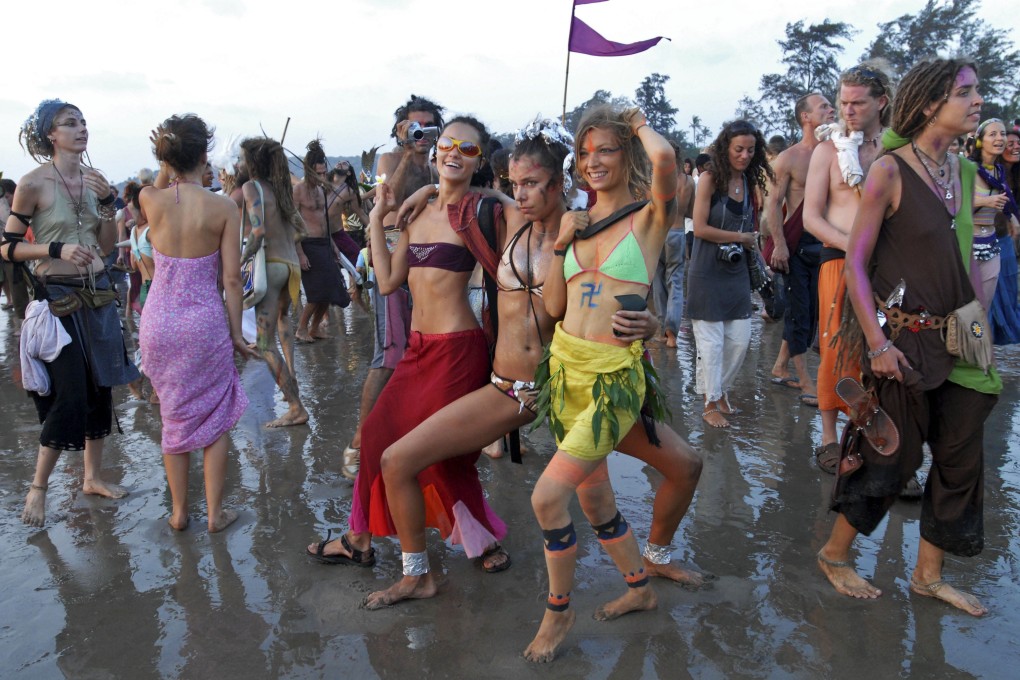 Young travellers party on a beach in the Indian resort of Goa in pre-pandemic times. Some countries are saying they would rather appeal to a higher class of tourist when normal travel resumes. Photo: Getty Images