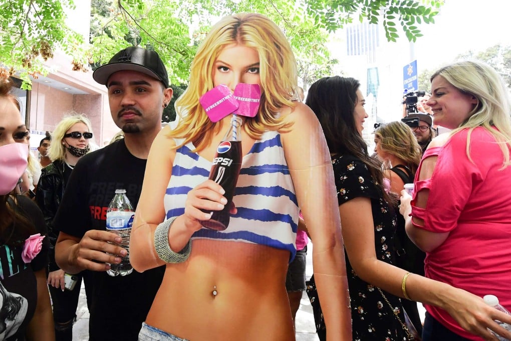 A life-size cardboard cutout of Britney Spears in seen as fans and supporters gather outside the County Courthouse in Los Angeles, California on June 23, during a scheduled hearing in Spears’ conservatorship case. Photo: AFP