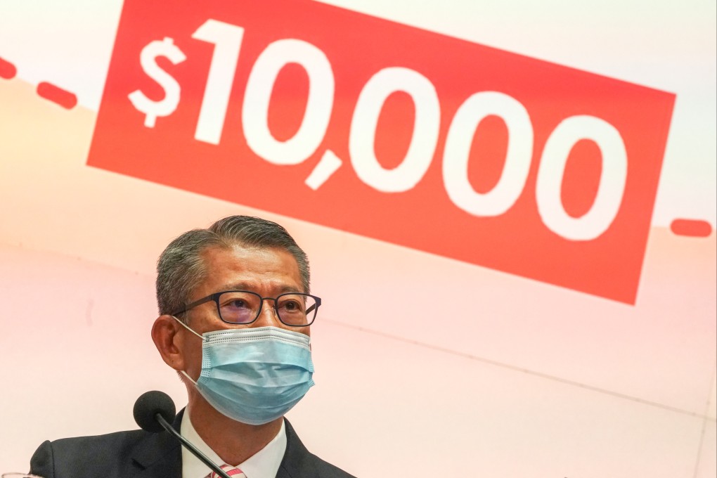 Financial Secretary Paul Chan Mo-po speaks to the press on the Hong Kong government’s HK$10,000 cash handout for 2020, at the government headquarters on June 8 last year. Photo: Felix Wong