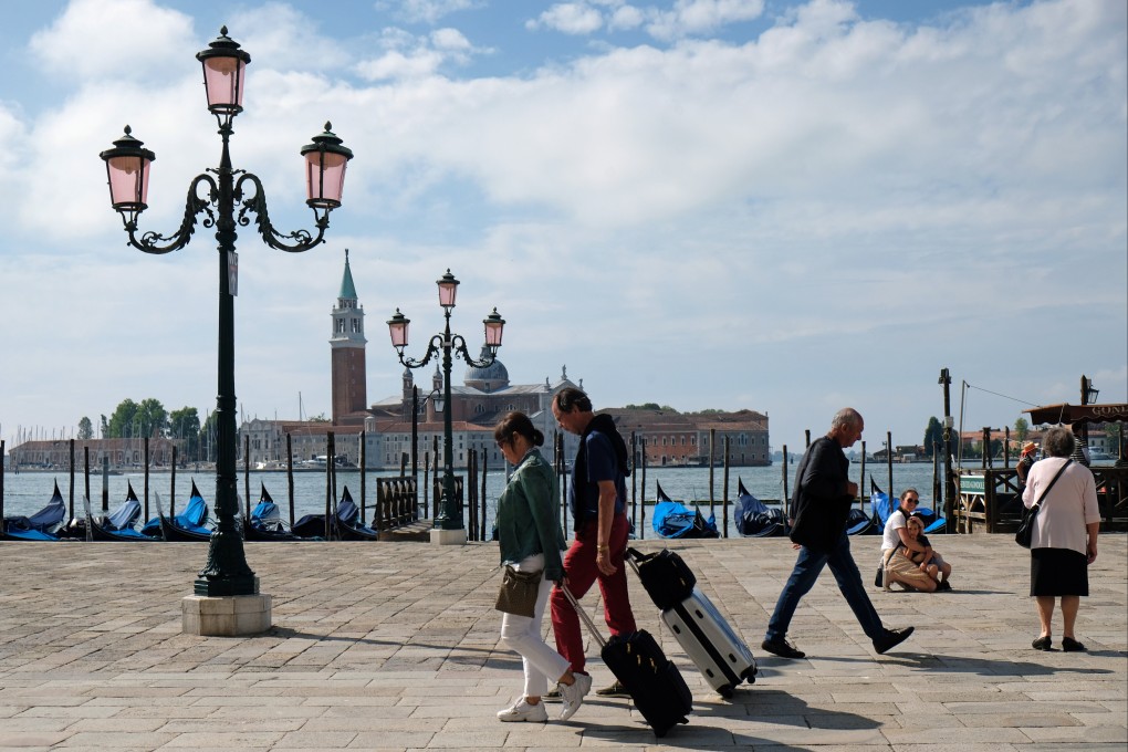 Tourists are seen near St Mark’s Square in Venice, Italy in June 2020. European Union citizens enjoy freedom of movement across the EU. Photo: Reuters