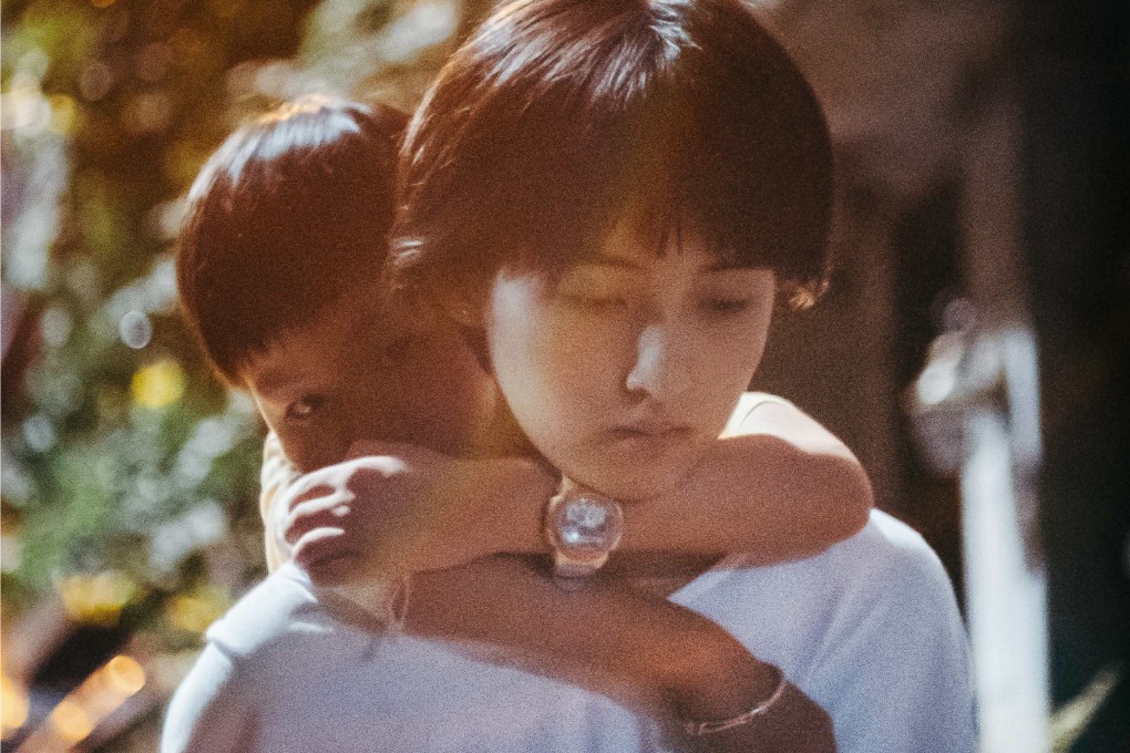 Zhang Zifeng (front) and Jin Yaoyuan play sister and brother in the film Sister (category: IIA, Mandarin), directed by Yin Ruoxi.