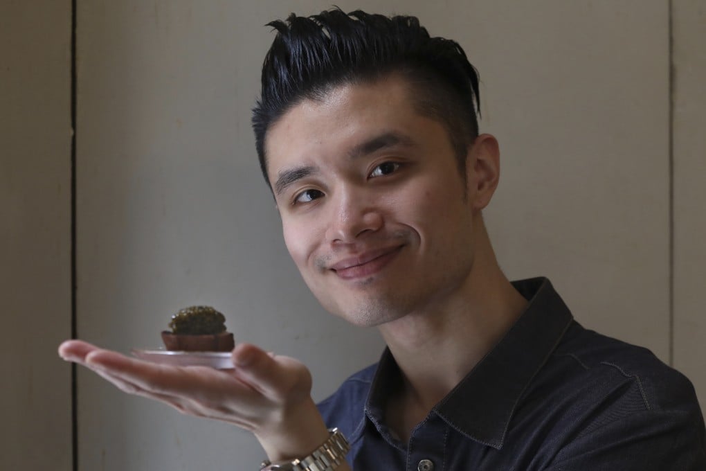 Leonard Cheung, chef-owner of Cultivate in Central, Hong Kong with his banana bread and caviar dish. Photo: Jonathan Wong