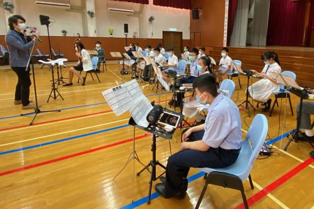 Students use iPads and the GarageBand app to create and perform their own music. Photo: courtesy of Michael Leung Chi-hin