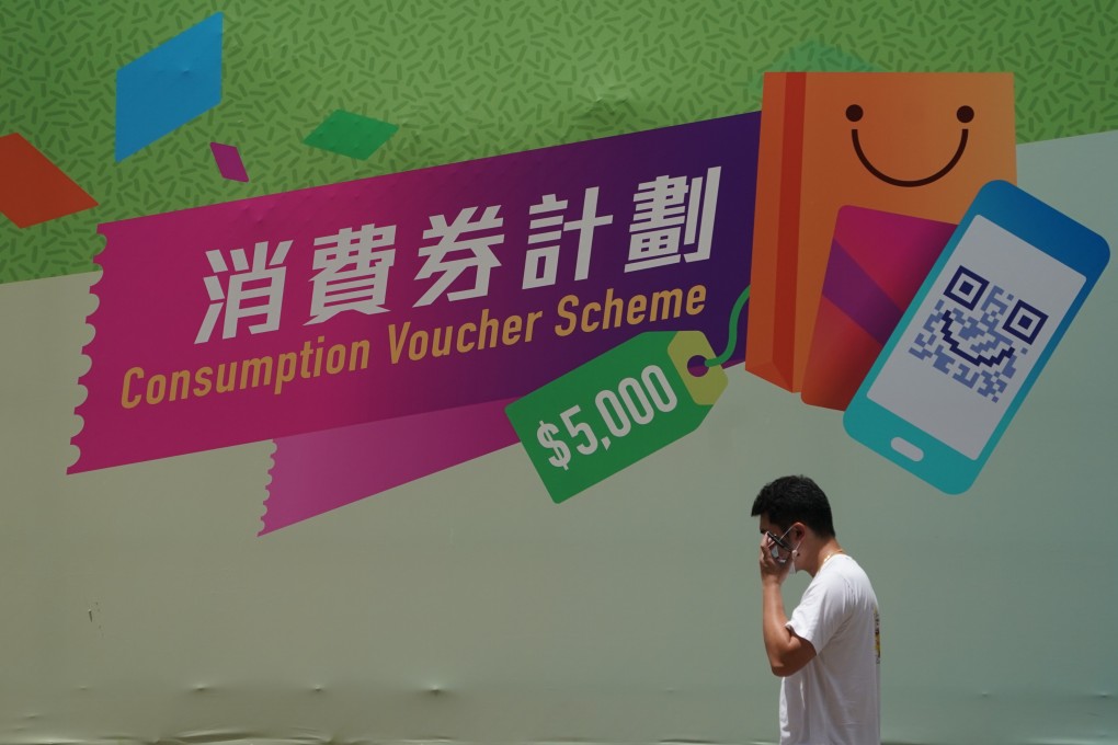 A banner advertises the Hong Kong government’s consumption voucher scheme in Sham Shui Po. Photo: Felix Wong