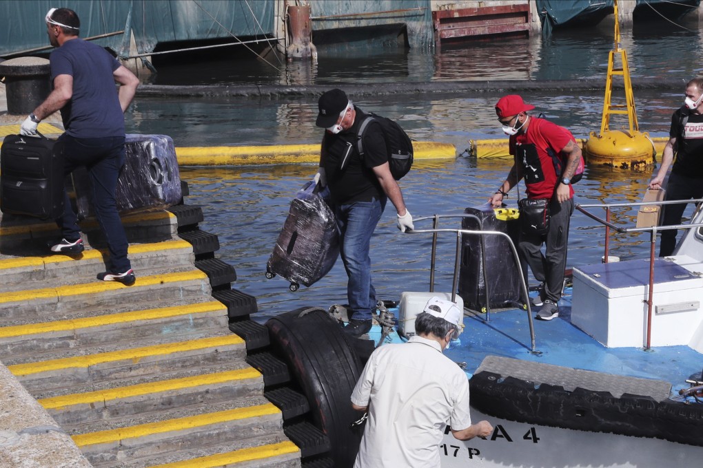 Seafarers arrive for a crew change at Hoi Fai Road Promenade in Tai Kok Tsui on July 26, 2020. Photo: Edmond So