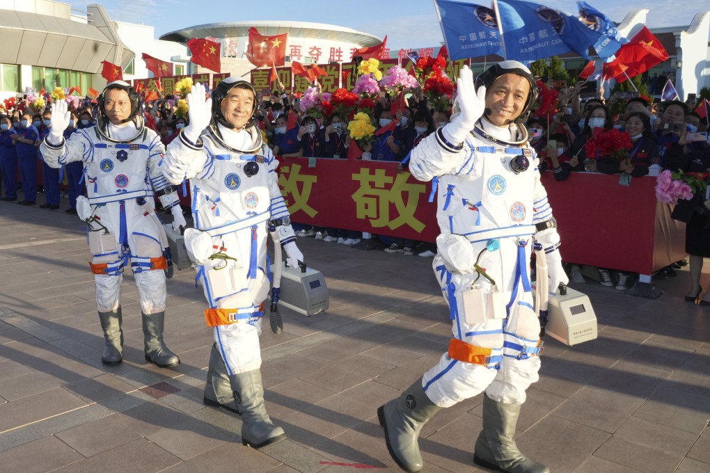 The crew of the Shenzhou 12 Chinese space mission receive a send-off at the Jiuquan Satellite Launch Centre in northwest China before their voyage into space. Photo: Li Gang