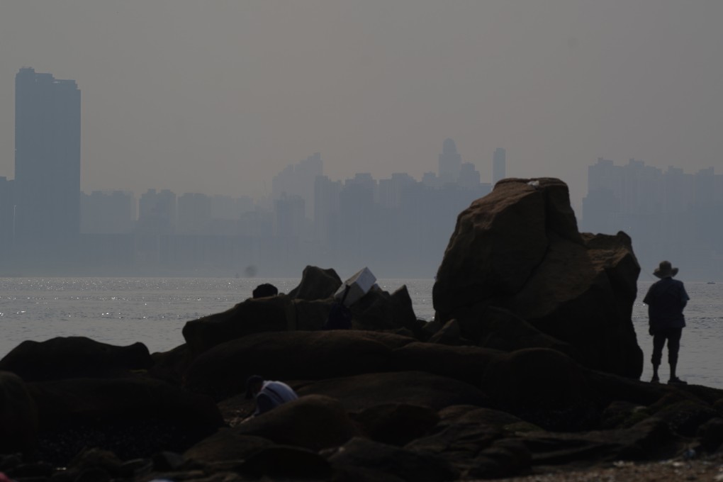 Hong Kong Island, seen from Lei Yue Mun, sits shrouded in smog on June 6. Photo: Sam Tsang
