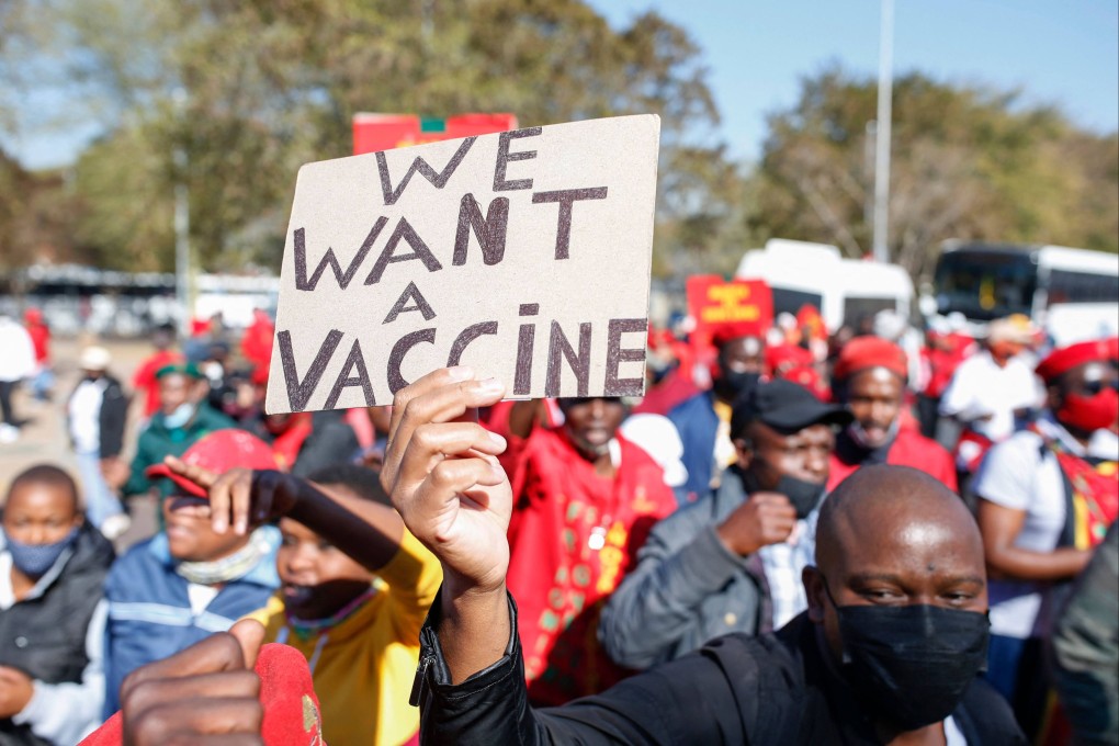 Protesters march to the South African Health Products Regulatory Authority (SAHPRA) offices in Pretoria on June 25 to demand that vaccines from Russia and China be approved and given to South Africans amid a desperate vaccine shortage and a rise in infections. Photo: AFP