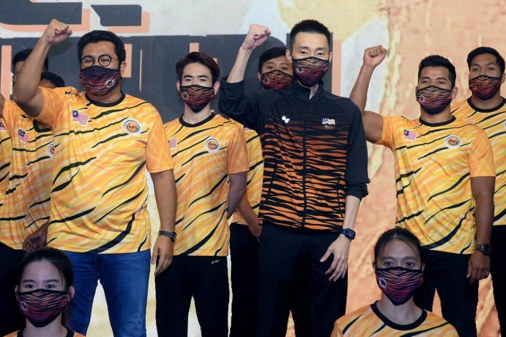 The striking tiger stripes of Team Malaysia’s kit, made by Japanese manufacturer Yonex.