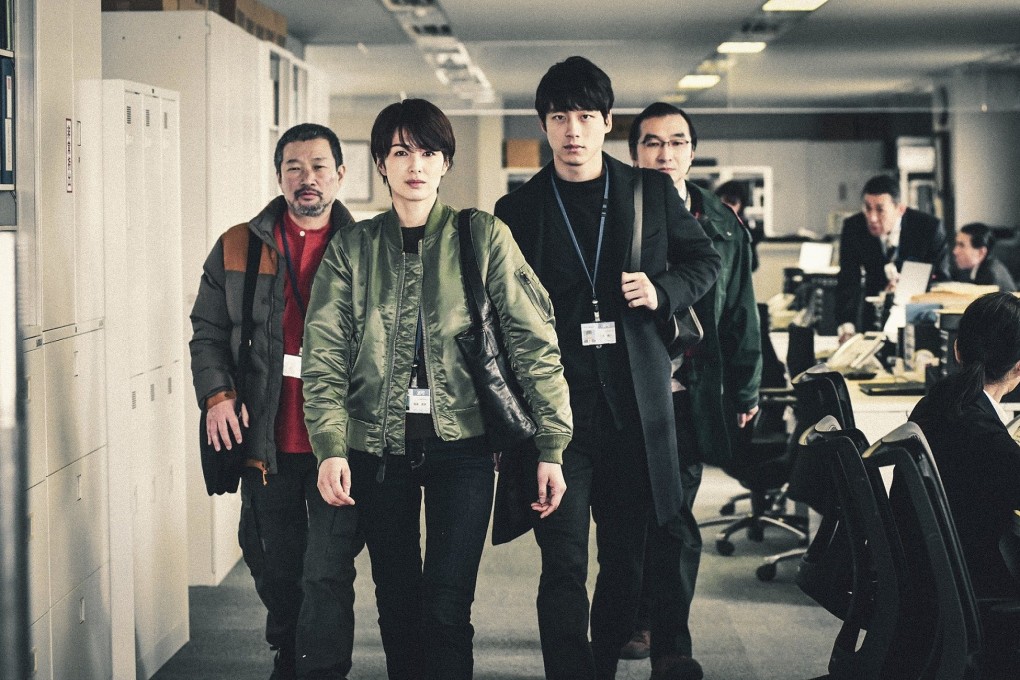 Michiko Kichise (front left) and Kentaro Sakaguchi in a still from Signal the Movie (category IIB; Japanese), directed by Hajime Hashimoto. Kazuki Kitamura also stars.