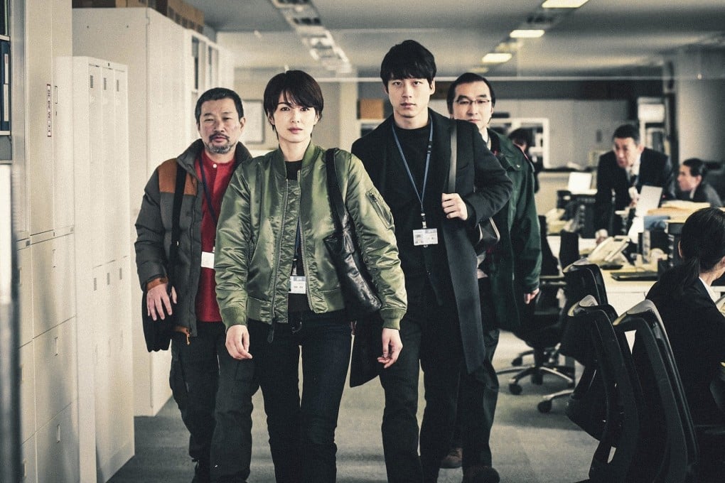 Michiko Kichise (front left) and Kentaro Sakaguchi in a still from Signal the Movie (category IIB; Japanese), directed by Hajime Hashimoto. Kazuki Kitamura also stars.