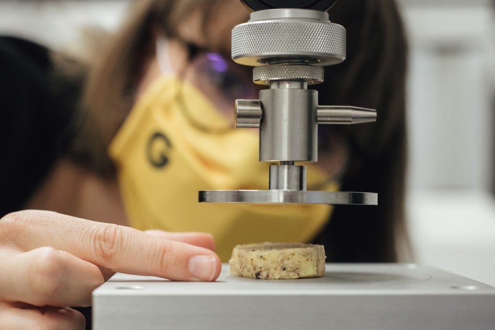 Marion Gaff, a food engineer at Gourmey, carries out density tests on lab-grown foie gras at the start-up’s laboratory in Paris, France. Photo: Bloomberg