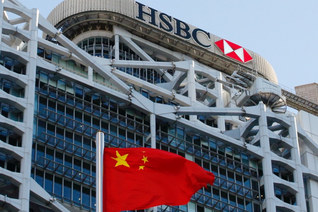 A Chinese flag flies in front of HSBC’s headquarters in Hong Kong. Photo: Reuters