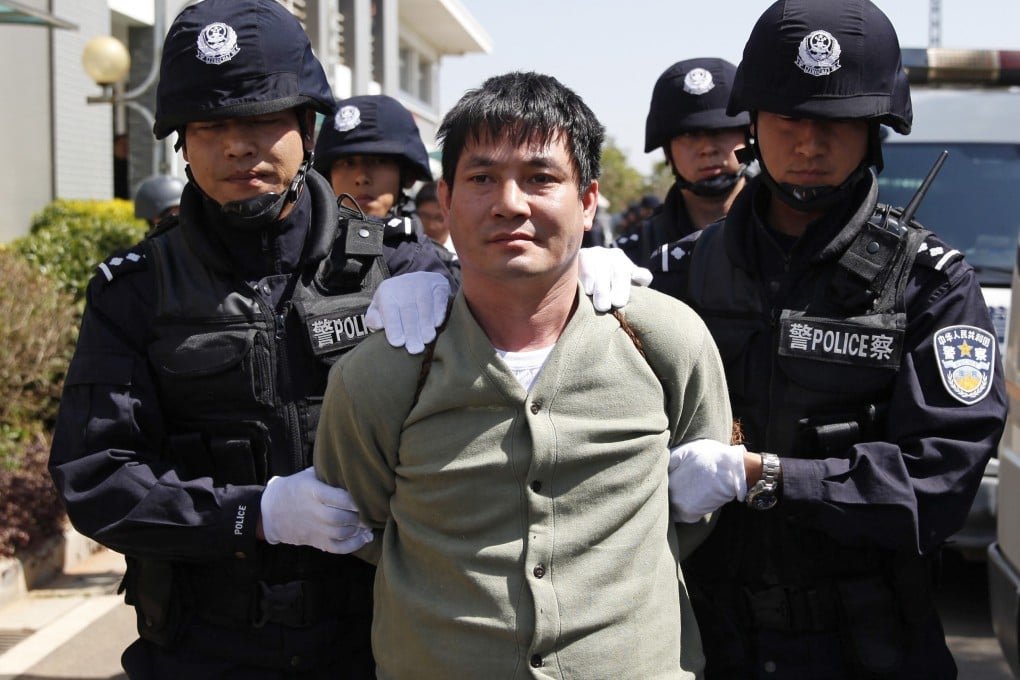 Myanmar drug lord Naw Kham is taken for execution in Kunming, China, for the killing of 13 Chinese sailors in an attack on the Mekong River that spotlighted drug smuggling and extortion rackets along the vital waterway. Photo: AP /Xinhua