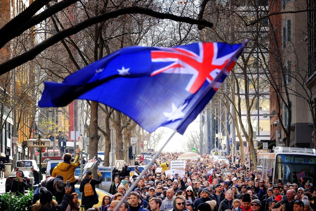 Protesters take part in a “World Wide Rally For Freedom” anti-lockdown rally in Melbourne, Victoria, on July 24. Photo: EPA-EFE