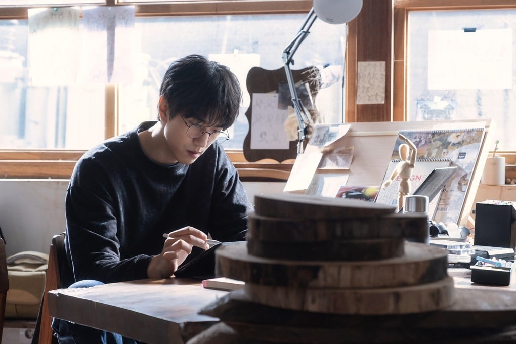 Sung Joon in a scene from Ghost Mansion. The Korean horror anthology sees a webtoon artist visit a haunted apartment for stories.