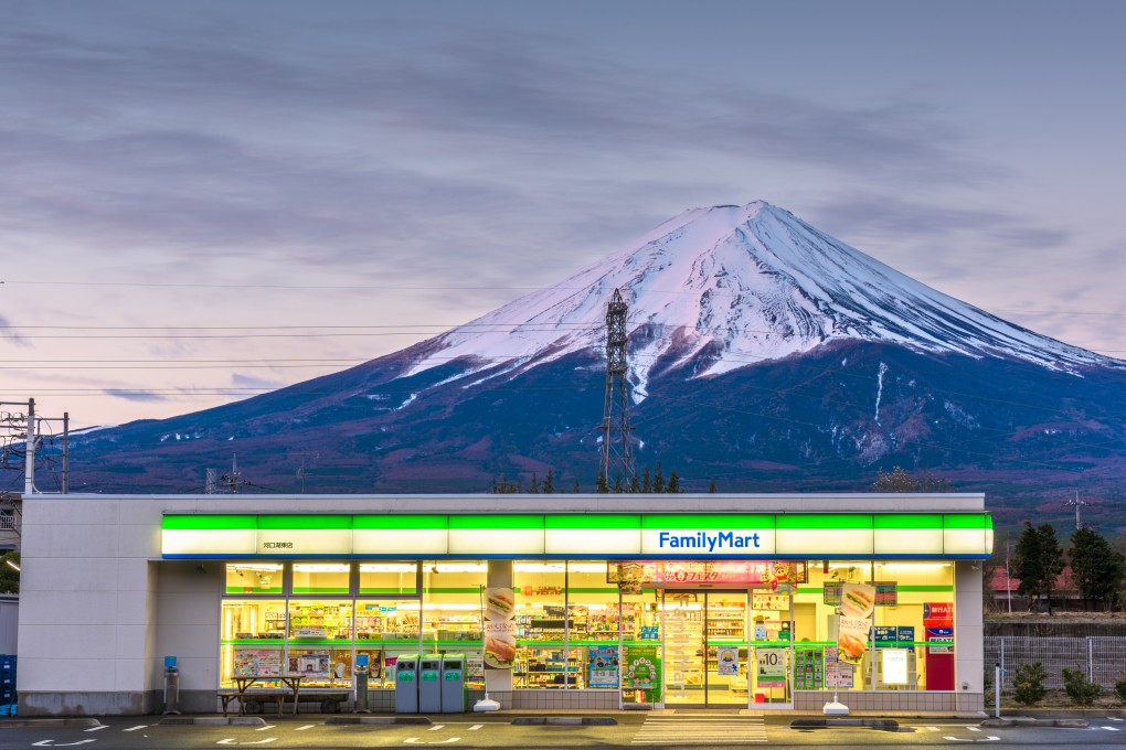 A FamilyMart convenience store, the second largest chain in Japan, under Mount Fuji Photo: Shutterstock