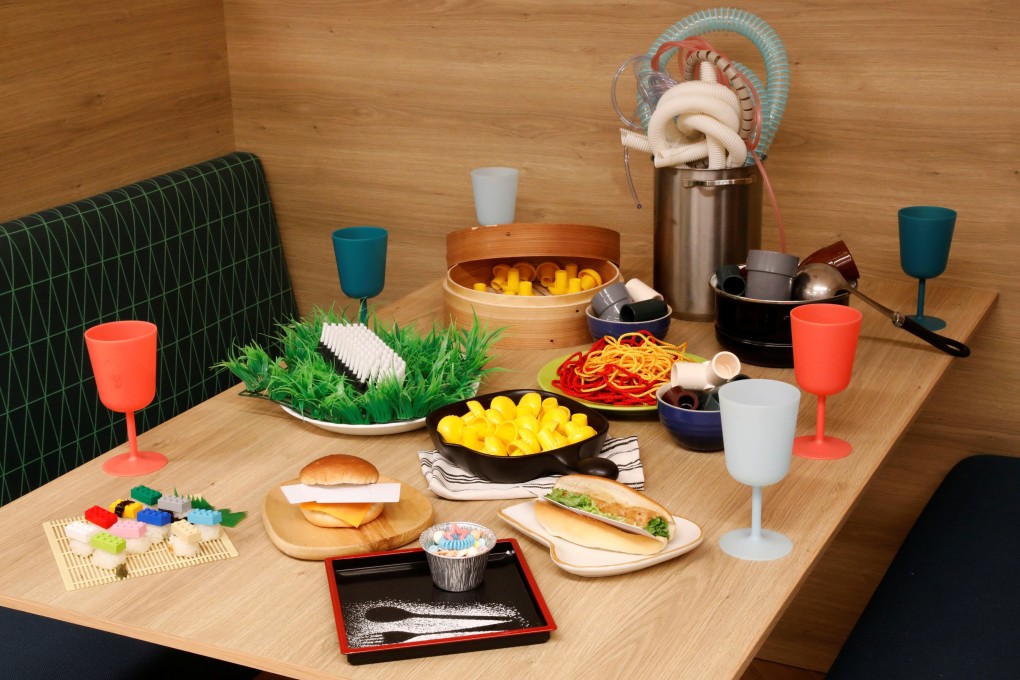 Various plastic goods weighing 1.3kg, equivalent to the amount of plastic that someone could eat in five years, are displayed on a table in this illustration taken in Tokyo, Japan, on November 12, 2020. People could be ingesting the equivalent of a credit card of plastic a week, a 2019 study by WWF International concluded, mainly in plastic-infused drinking water but also via food like shellfish, which tends to be eaten whole so the plastic in their digestive systems is also consumed. Photo: Reuters