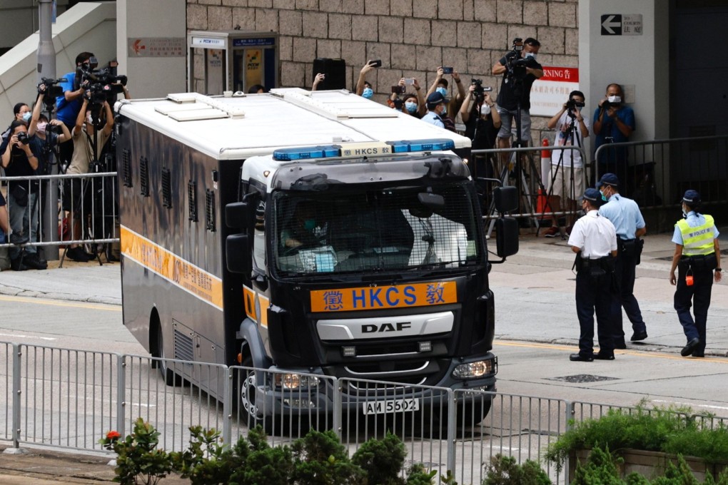 A prison van carrying Tong Ying-kit, the first person charged under the new national security law, leaves the High Court after Tong was sentenced to nine years in prison on July 30. Photo: Reuters
