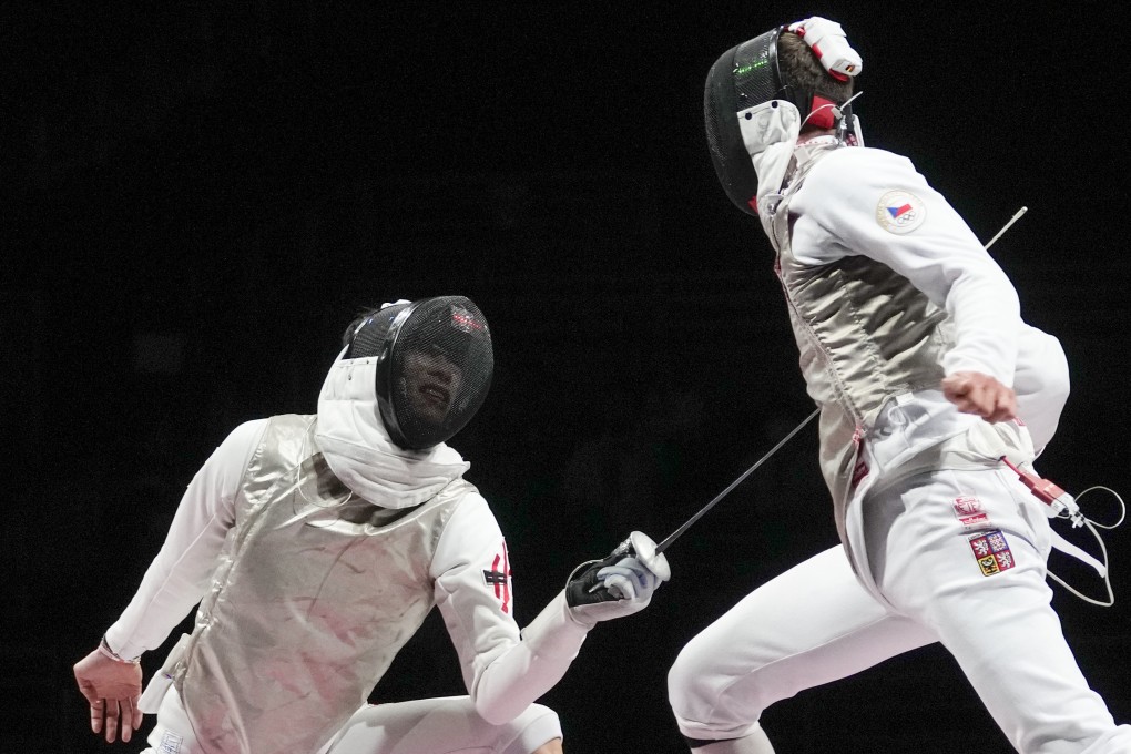 Edgar Cheung Ka-long (left) competes in the men’s individual foil semifinal at the Olympics in Chiba, Japan, on July 26. Photo: AP