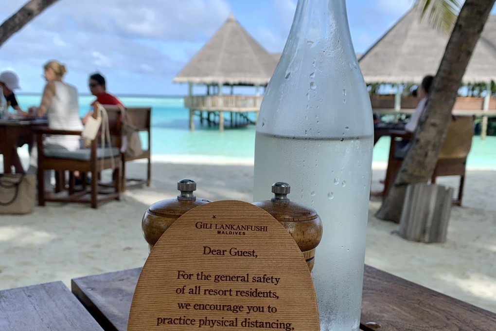 This discreet notice to guests at Gili Lankanfushi in the Maldives is one of the few reminders of the coronavirus pandemic - unless, like our reporter, you go island-hopping and endure multiple Covid-19 tests. Photo: Lee Cobaj