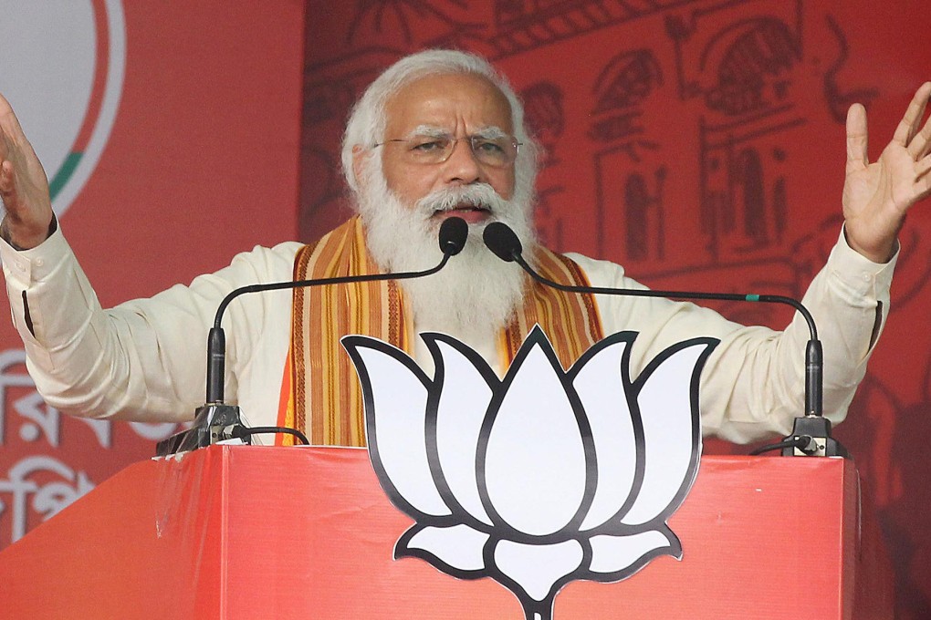Indian Prime Minister Narendra Modi speaks to supporters during a campaign rally. Photo: TNS