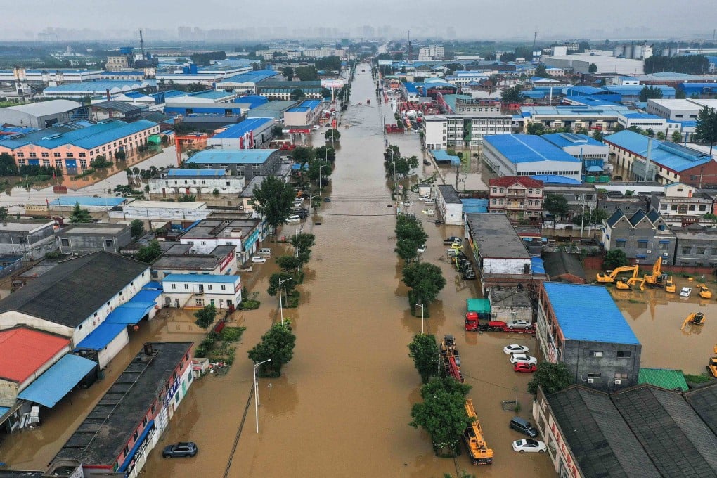 Flooded buildings and streets following heavy rains in Xinxiang, in China’s central Henan province, on July 23, 2021. Photo: AFP