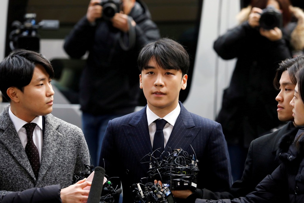 Seungri, then still a member of South Korean K-pop band Big Bang, arrives to be questioned at the Seoul Metropolitan Police Agency in March 2019. Photo: Reuters