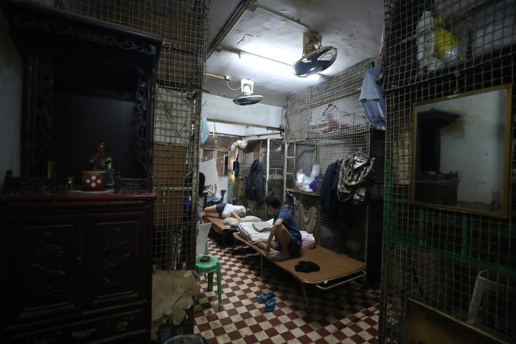 A subdivided flat with wire cages in Tai Kok Tsui on August 3. The government estimates there are more than 200,000 people living in over 100,000 similar units. Photo: Xiaomei Chen