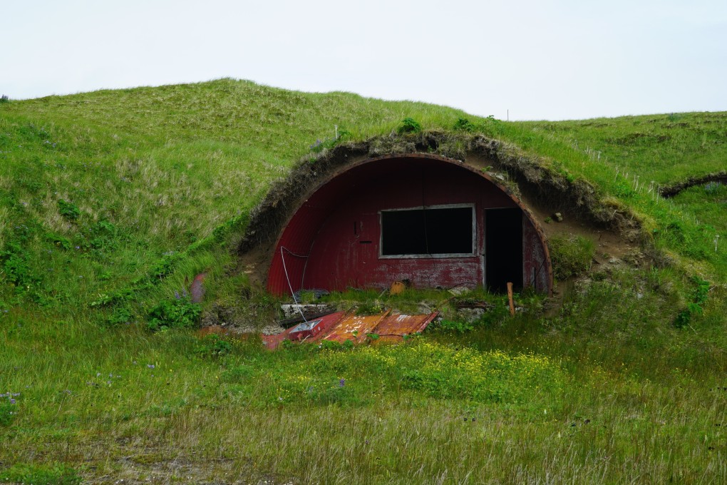 A Cold War-era bunker, one of many that dot hillsides across Adak Island, Alaska. Visitors to the remote island can explore the decaying relics, the dozens of military facilities left behind in 1997, and the island’s stunning countryside. Photo: AP