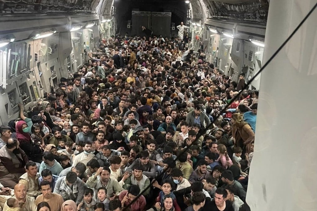 Hundreds of Afghan citizens are evacuated on an US Air Force C-17 Globemaster III airplane after the fall of Kabul. Photo: DPA