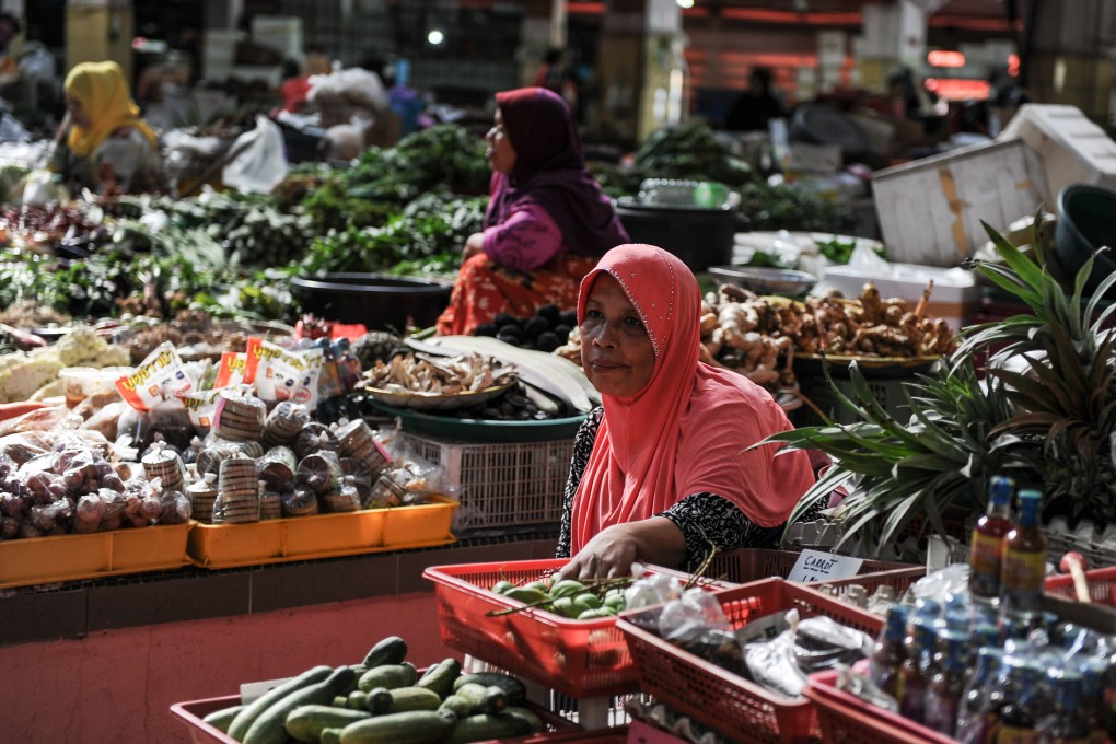 A produce market in Kelantan, northeast Malaysia. The profusion of ingredients available to the country’s cooks owes a lot to migrants from elsewhere in Asia. Photo: AFP