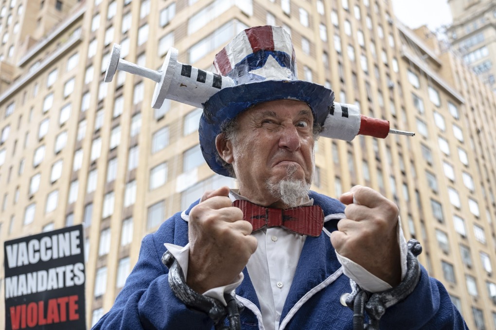 A man dressed as Uncle Sam protests against recent mandates requiring vaccines against Covid-19, in New York’s Central Park on August 21. Photo: AP