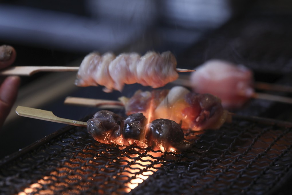 Yakitori being grilled at Yokai at H Queen’s in Central. Photo: Jonathan Wong