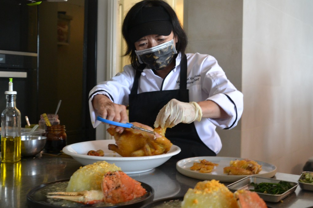 Margaret Xu Yuan prepping “yellow earth chicken” at Yin Yang Coastal, one of three off-the-beaten-track spots in Hong Kong serving memorable cuisine in relaxed surroundings. Photo: Chris Dwyer