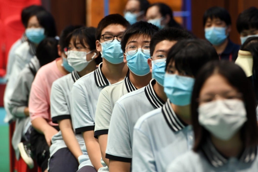 Students wait at an observation area after receiving Covid-19 vaccines at a school in Zhengzhou, Henan province, on August 19. China has some way to go in vaccinating its population. Photo: Xinhua