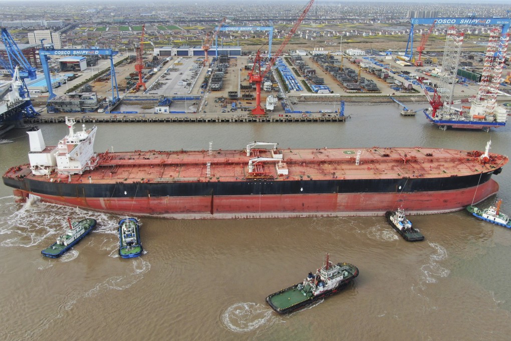Tugboats push a large crude oil tanker to a shipyard on the Yangtze River in Qidong, Jiangsu province. In 2020, China, the world’s biggest oil importer, took advantage of a plunge in global prices to build up its stockpiles. Photo: AP
