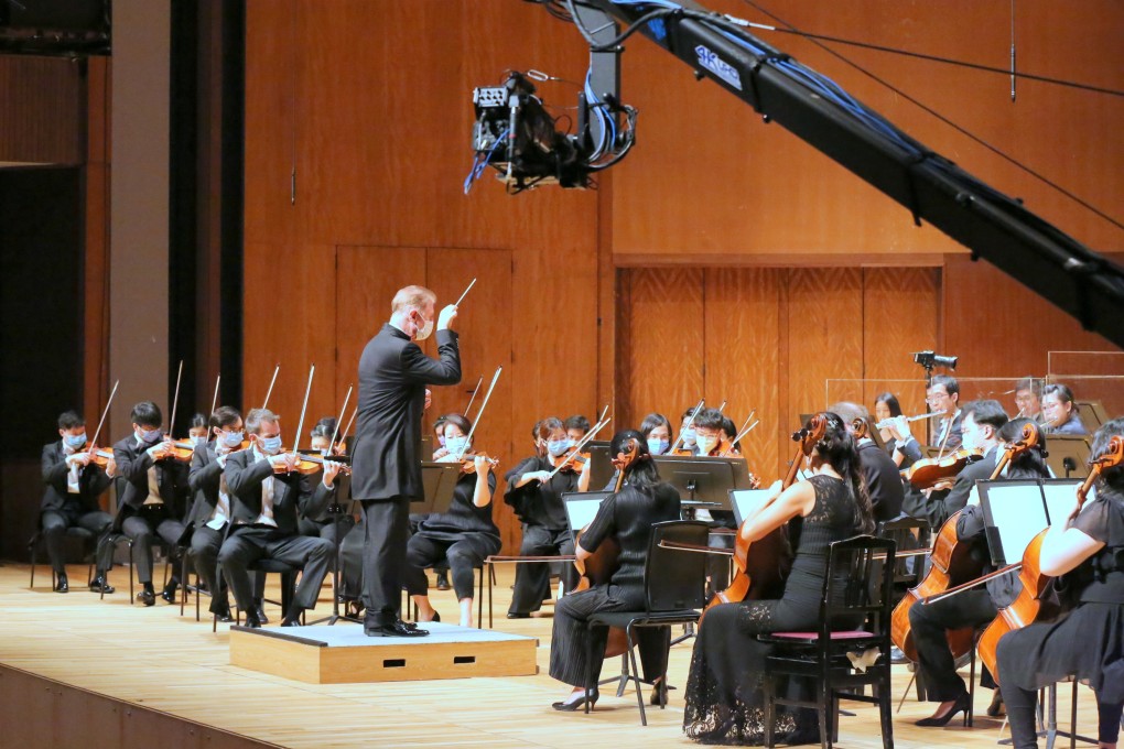 The Hong Kong Sinfonietta under principal guest conductor Christoph Poppen perform during filming of their second concert film under coronavirus lockdown, Back on Stage II (Quarantined!). The film, one of three the orchestra shot, is being screened as part of the Life is Art festival. Photo: HK Sinfonietta Ltd