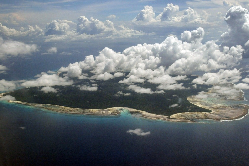Clouds hang over the forested North Sentinel Island, where a ship mostly crewed by Hong Kong sailors ran aground in 1981, sparking fears the island’s natives would attack them. Photo: AP