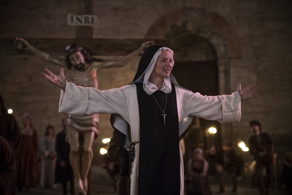 Virginie Efira in a scene from Benedetta (category: III, French), directed by Paul Verhoeven and co-starring Daphne Patakia.