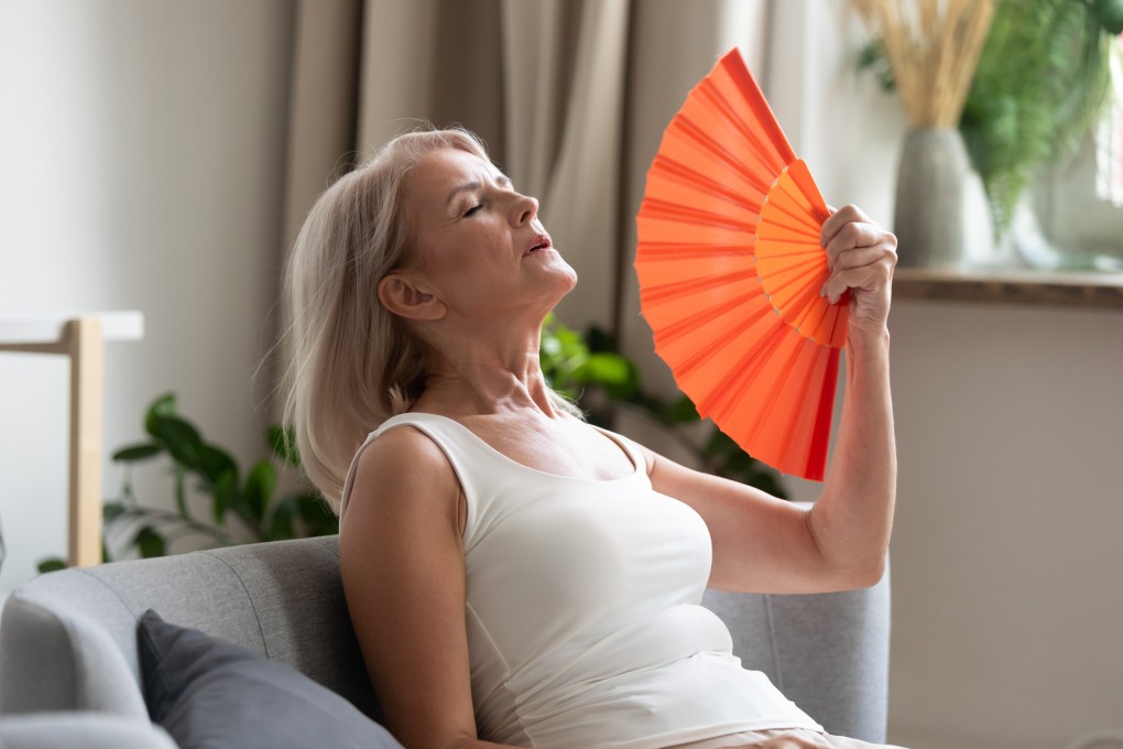 Hot flashes are one of many symptoms women can experience while going through menopause, with others including night sweats, vaginal dryness, weight gain, insomnia, migraines, and feeling anxious and irritable. Photo: Getty Images/iStockphoto