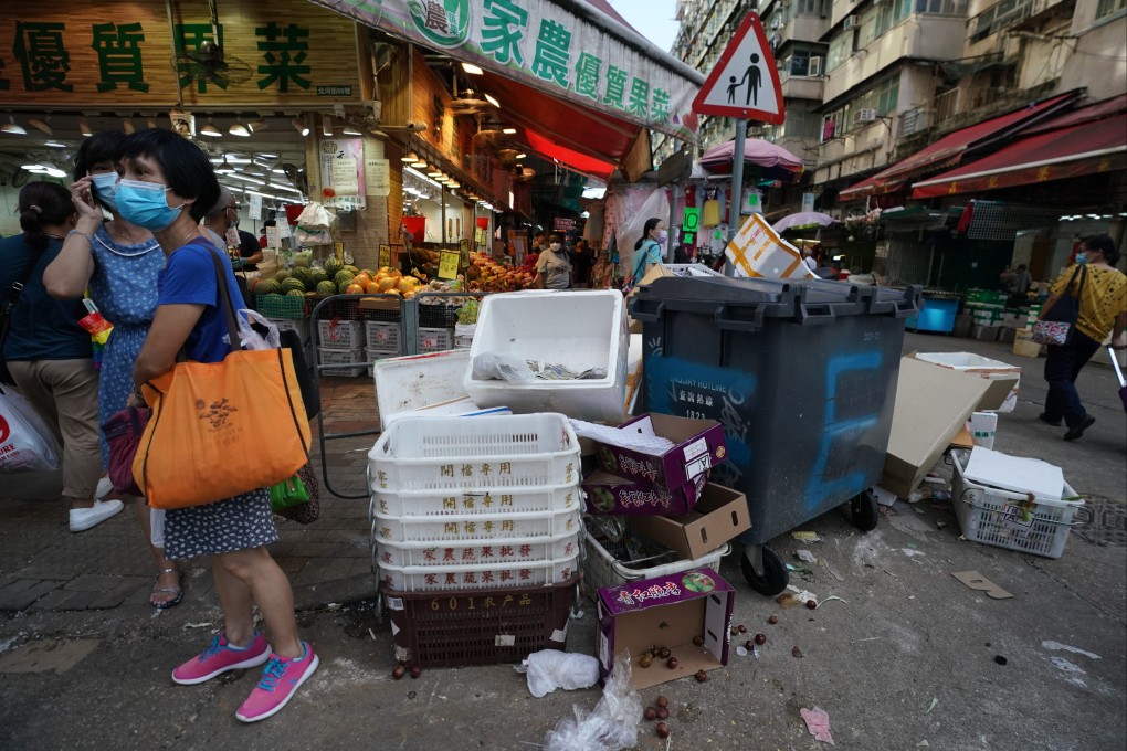 Rubbish is piled up next to a bin in Sham Shui Po on August 26. Photo: Felix Wong
