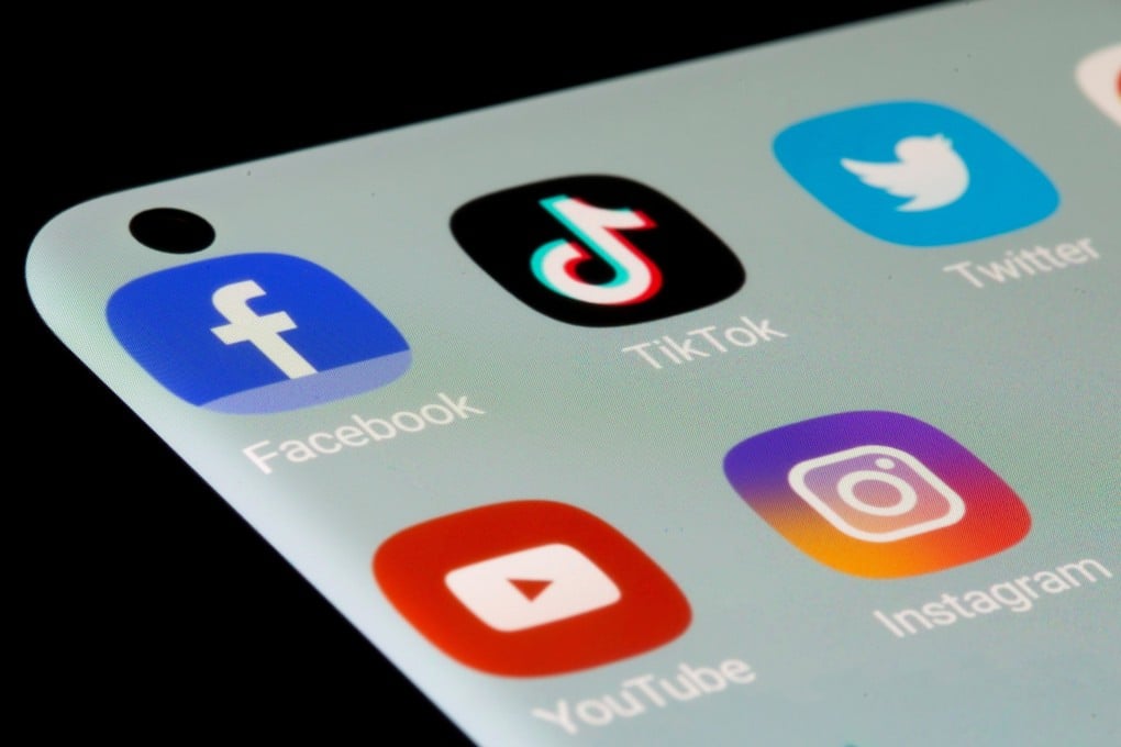 Social media apps Facebook, TikTok, Twitter, YouTube and Instagram are seen on a smartphone. The major internet media argue that they have the private property right to determine what appears on their electronic pages and what does not. They are right. Photo: Reuters