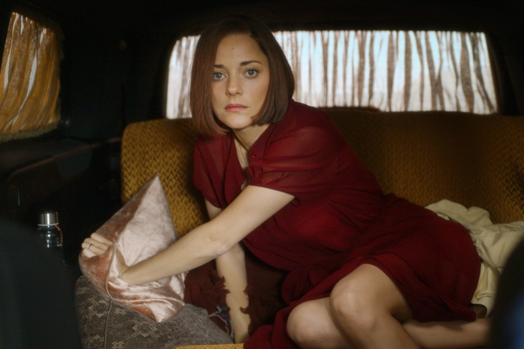Marion Cotillard in a still from Annette (category: III), directed by Leos Carax and co-starring Adam Driver.