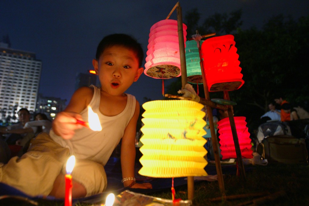 A boy celebrates Mid-Autumn Festival at Victoria Park in Causeway Bay, Hong Kong in 2004. Photo: SCMP