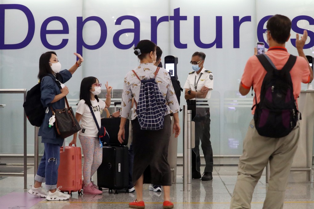 People head for Britain from Hong Kong International Airport on June 29. Even among those getting on planes to the UK today, many are keeping open their options to return. Photo: Edmond So