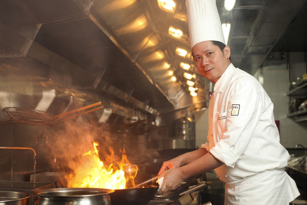 Mok Kit-keung at work in 2013 in the kitchen of Shang Palace, the Chinese fine-dining restaurant at the Kowloon Shangri-La hotel in Tsim Sha Tsui, Hong Kong, where he was  executive chef. Mok has died suddenly in Singapore at the age of 58. Photo: Paul Yeung
